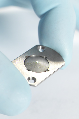 Germanium ATR crystal in its holder showing flat sampling surface at the base.