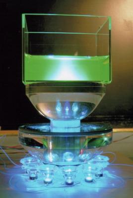 First "lash-up" of the new optical system delivering light into a tank of fluorescein dye.